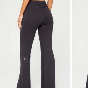 fabletics boost powerhold high-waisted flare pant in midnight